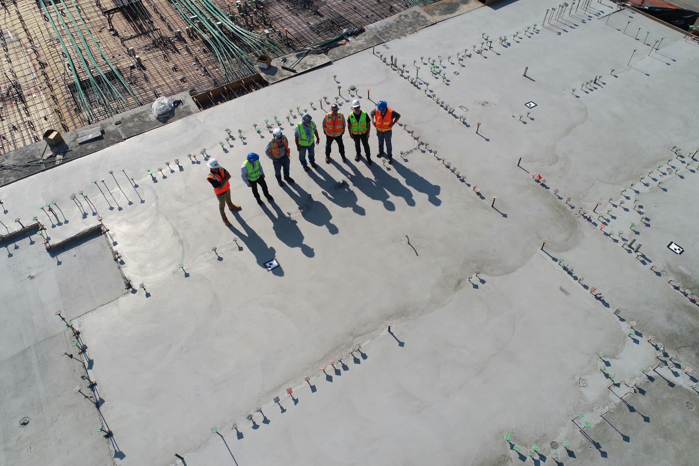 Acecal team on a finished concrete slab