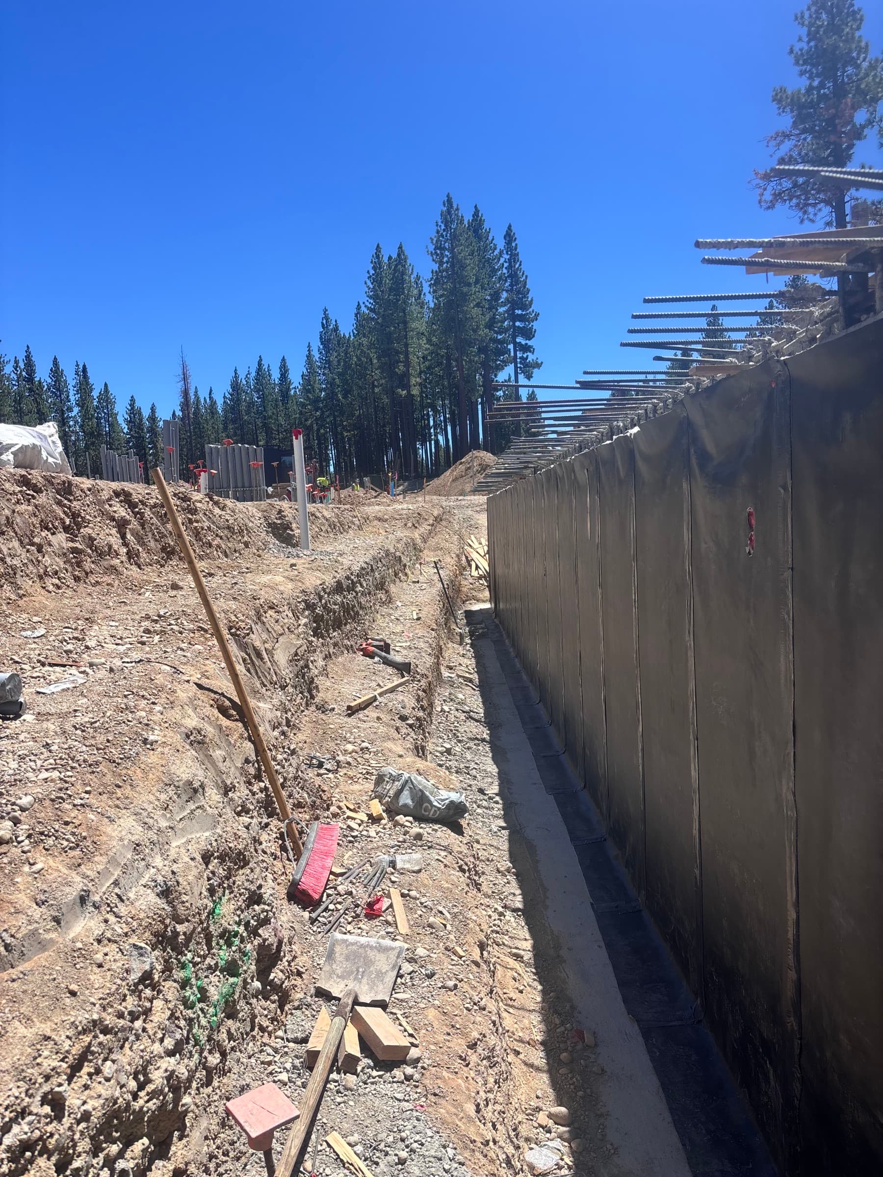 Waterproofed foundation wall before backfill