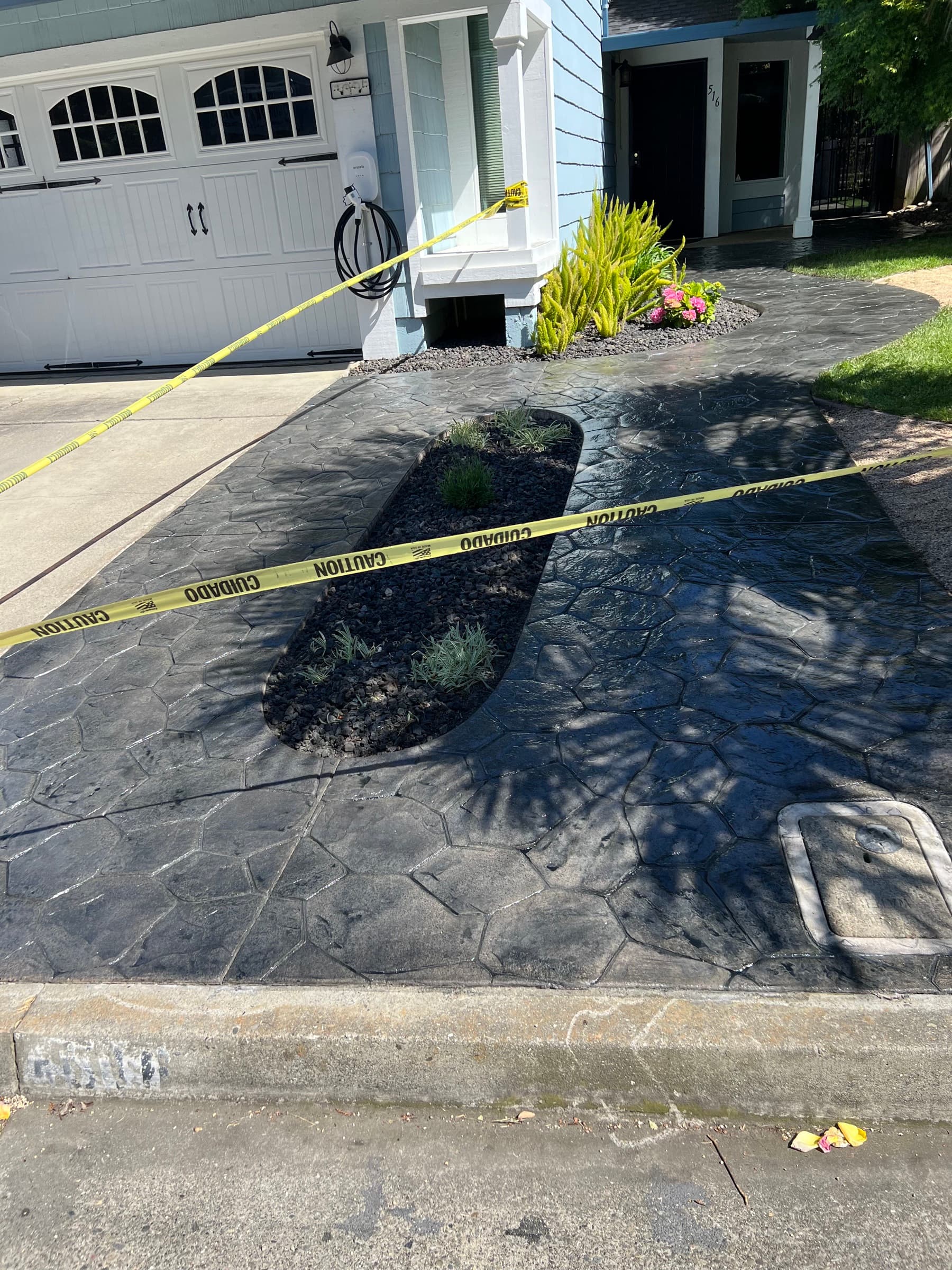 Stamped concrete driveway and walkway at a home